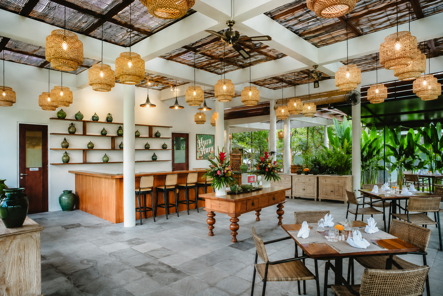 Guests sharing food together at Hura Restaurant
